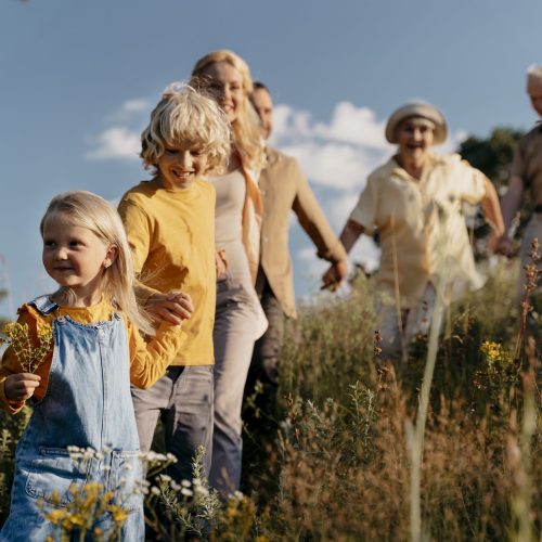 medium-shot-happy-family-nature